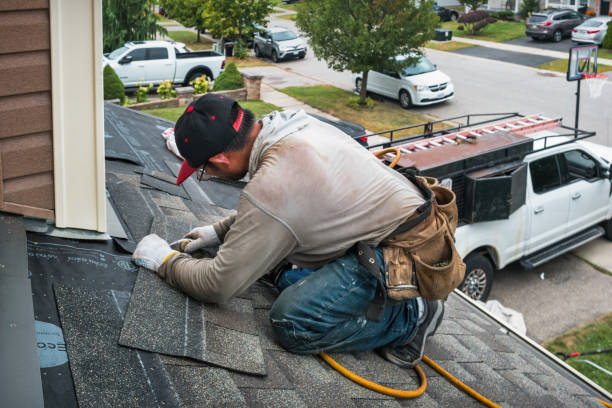 Professional Roofing technician working in East Derry, NH